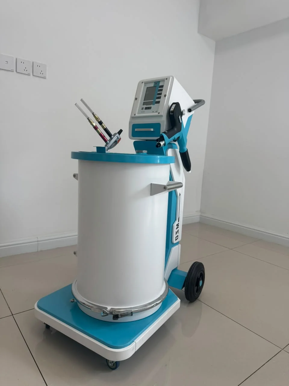 Powder coating machine on trolley with powder hopper and spray gun
